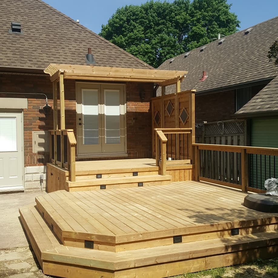 Pergola Over Patio Doors Leading to Wooden Deck in London Ontario